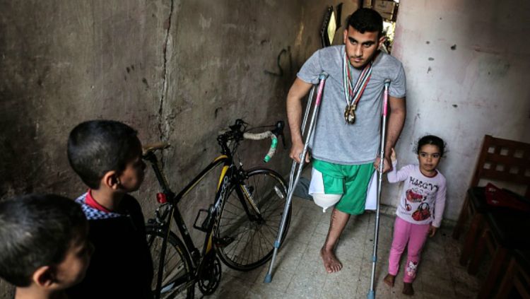 Alaa Al-Daly, atlet sepeda Palestina yang kakinya diamputasi karena tertembak tentara Israel. Copyright: © INDOSPORT