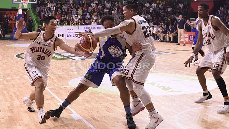 Satria Muda Pertamina juara IBL 2018 Copyright: Â© INDOSPORT/Herry Ibrahim