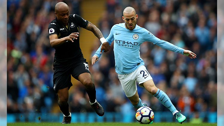 David Silva saat membawa bola Copyright: © Getty Images