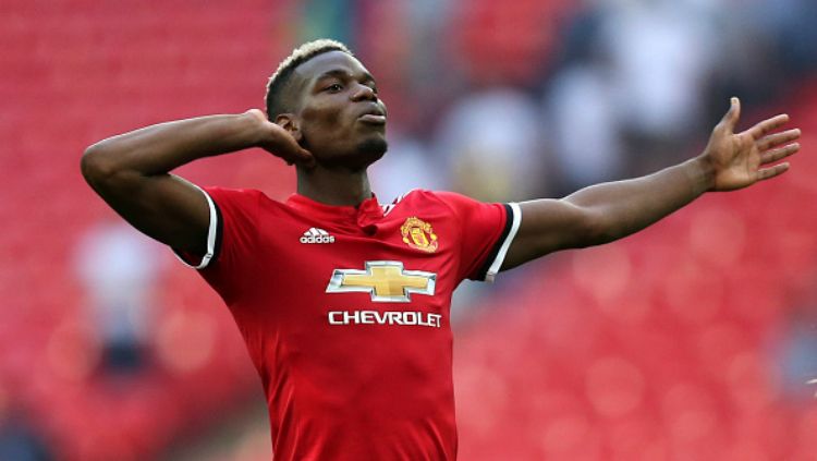 Paul Pogba ketika melakukan selebrasi. Copyright: © Getty Images