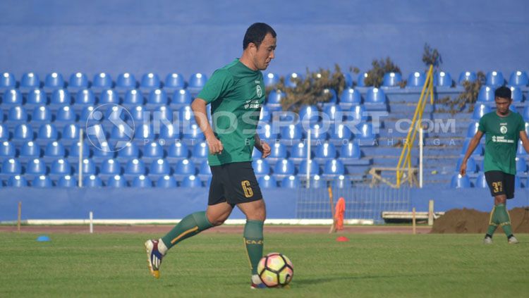 Yu Hyun-koo, pemain Sriwijaya FC saat sedang latihan. Copyright: © Muhammad Effendi/INDOSPORT