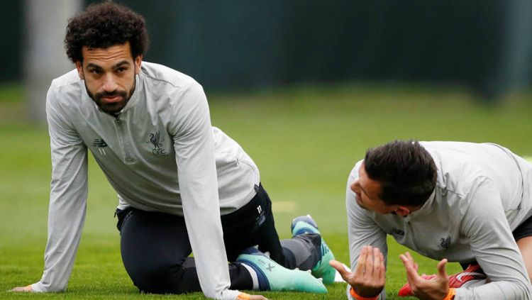 Mohamed Salah dan Dejan Lovren. Copyright: © Reuters