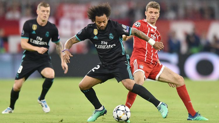 Marcelo merayakan golnya ke gawang Bayern Munchen. Copyright: Â© INDOSPORT