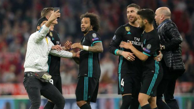 Suporter di laga Munchen vs Madrid. Copyright: © Reuters