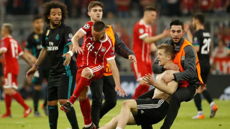Suporter di laga Munchen vs Madrid. Copyright: © Reuters