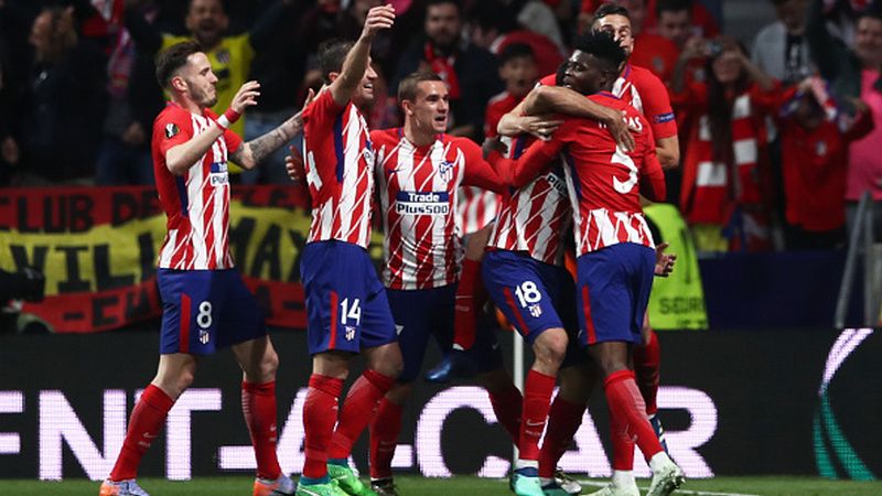 Skuat Atletico Madrid merayakan golnya ke gawang Arsenal beberapa waktu lalu. Copyright: © INDOSPORT