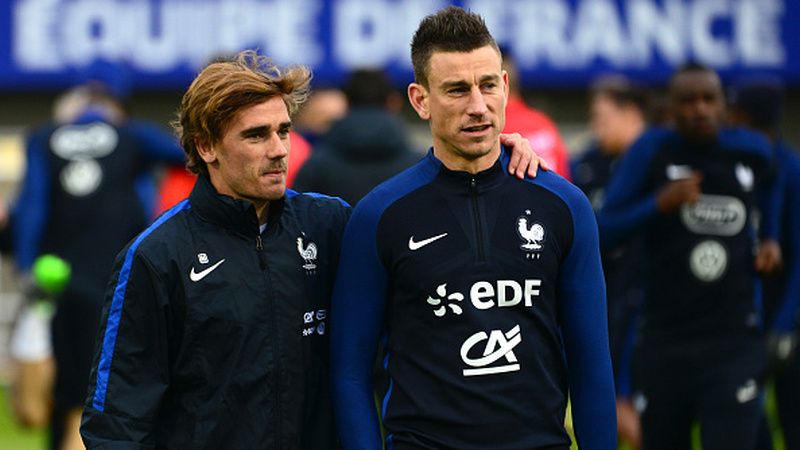 Laurent Koscielny dan Antoine Griezmann. Copyright: © INDOSPORT