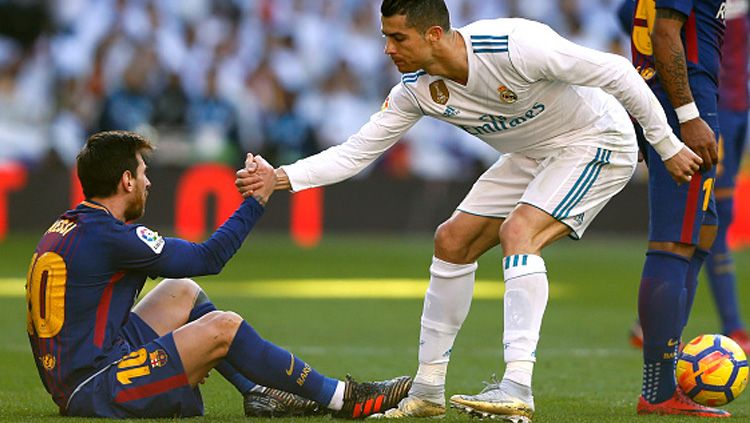 Lionel Messi (kiri/Barcelona) dan Cristiano Ronaldo (Real Madrid). Copyright: © INDOSPORT