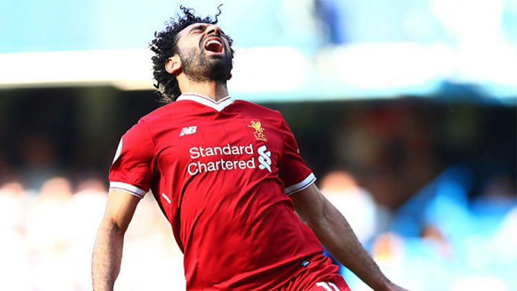 Reaksi Mohamed Salah usai cetak gol untuk Liverpool. Copyright: © INDOSPORT