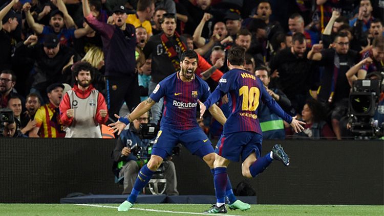 Selebrasi dua pemain bintang klub Liga Spanyol, Barcelona, Lionel Messi dan Luis Suarez. Copyright: © INDOSPORT