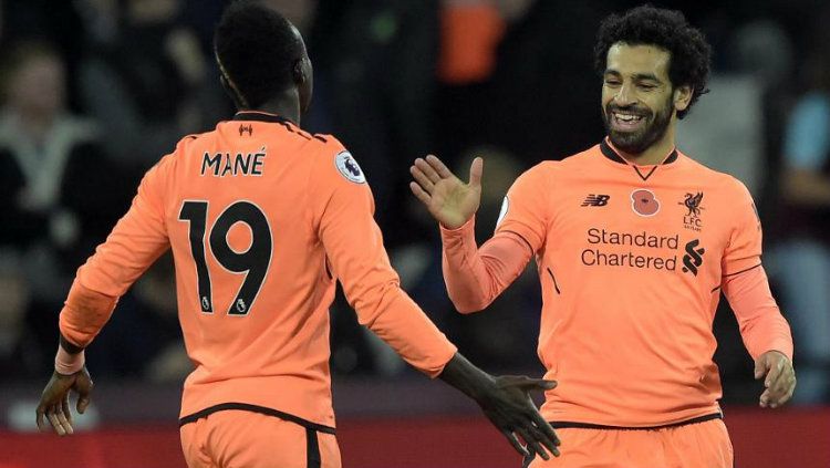 Duo bintang Liverpool, Sadio Mane dan Mohamed Salah belakangan ini memang sering bersaing menjadi Pemain Terbaik Afrika. Copyright: © premierleague.com