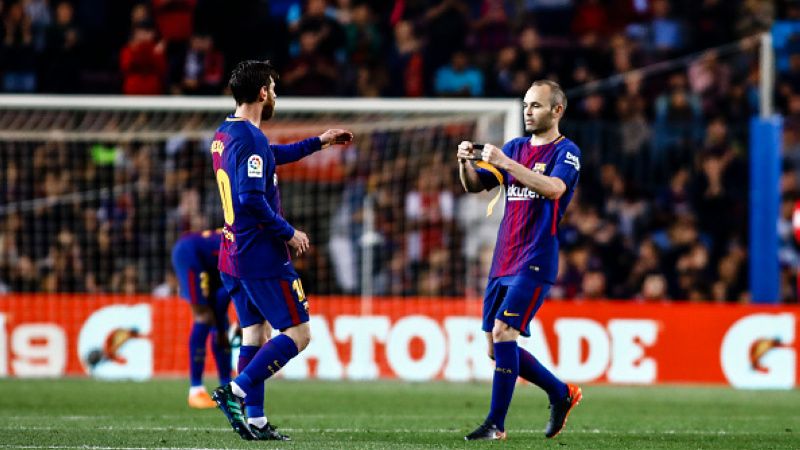 Andres Iniesta dan Lionel Messi. Copyright: © INDOSPORT