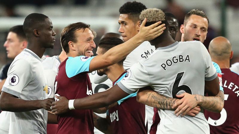 Pogba dan Noble saling berdamai pasca laga. Copyright: © INDOSPORT