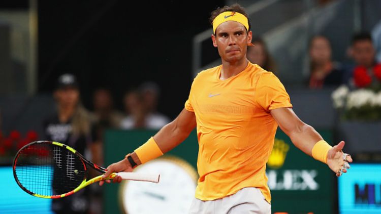 Rafael Nadal memecahkan rekor berusia 34 tahun. Copyright: © INDOSPORT
