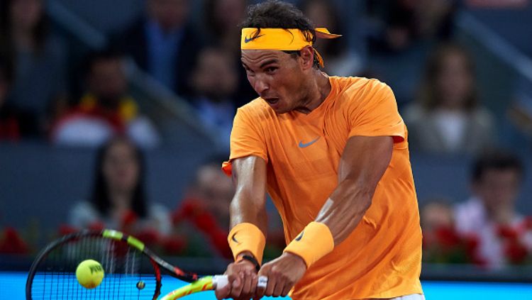 Rafael Nadal menang di babak ketiga Madrid Terbuka. Copyright: © INDOSPORT