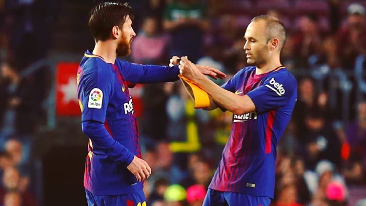 Andres Iniesta dan Lionel Messi. Copyright: © La Liga