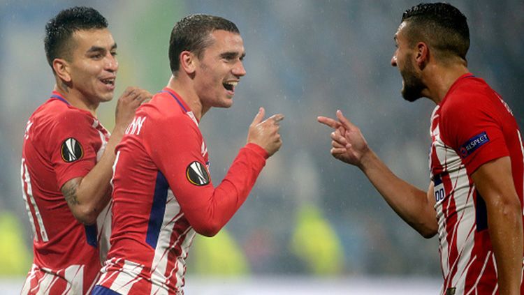 Selebrasi Antoine Griezmann usai mencetak gol pertama ke gawang Marseille. Copyright: © INDOSPORT