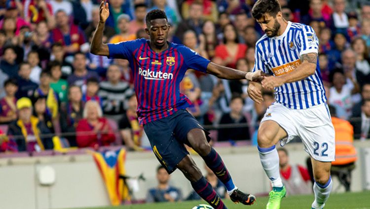 Ousmane Dembele saat tampil membela Barcelona melawan Real Sociedad. Copyright: © INDOSPORT