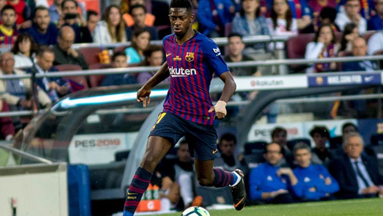 Ousmane Dembele saat tampil membela Barcelona melawan Real Sociedad. Copyright: © INDOSPORT