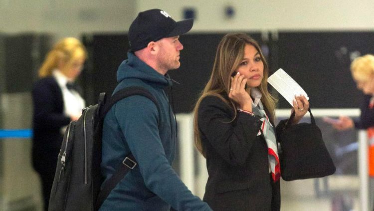 Wayne Rooney tiba di Washington DC. Copyright: © Splash News