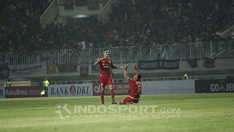 Selebrasi pemain Persija Jakarta. Copyright: © INDOSPORT/Herry Ibrahim