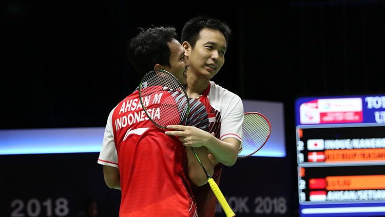Mohammad Ahsan/Hendra Setiawan takluk dari juniornya, Kevin/Marcus di Indonesia Open 2018. Copyright: © Humas PBSI