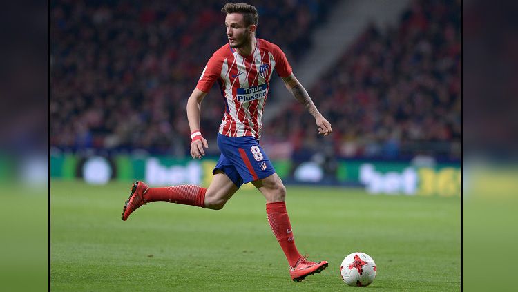 Manchester United sedang berharap-harap cemas. Pasalnya, pemain Atletico Madrid yang tengah diincar, Saul Niguez, akan mengumumkan klub tujuannya dalam tiga hari ke depan. Copyright: © Getty Image