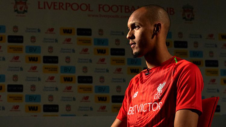 Pemain sepak bola Liverpool, Fabinho, kabarnya bakal pindah ke Real Madrid pada bursa transfer musim panas 2019. Copyright: © Getty Image