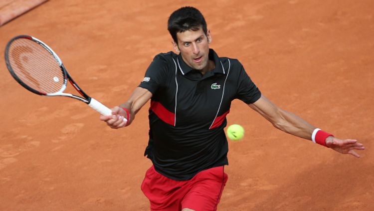 Novak Djokovic menumbangkan Fernando Verdasco di perempatfinal Prancis Terbuka 2018. Copyright: © INDOSPORT