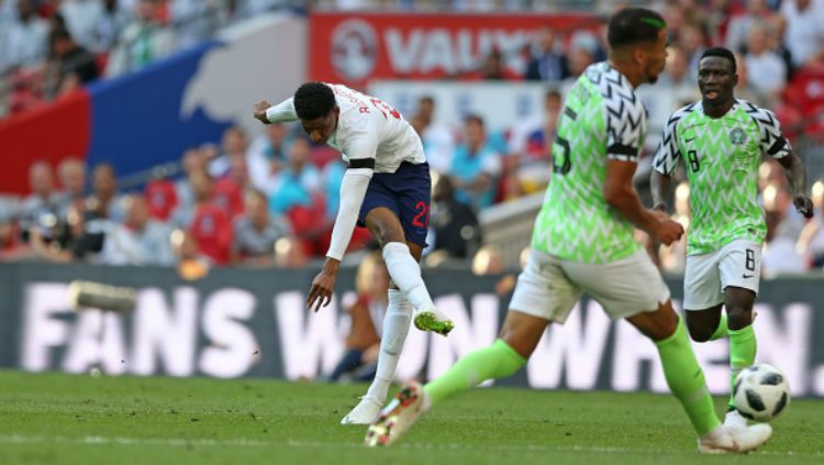 Marcus Rashford saat membela Timnas Inggris melawan Nigeria jelang Piala Dunia 2018. Copyright: © INDOSPORT