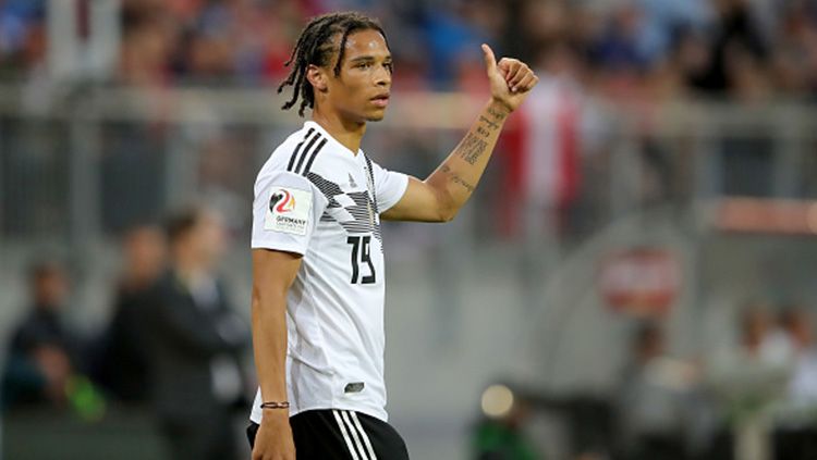 Penyerang Manchester City, Leroy Sane, menarik diri dari skuat Jerman menjelang laga persahabatan melawan Peru. Copyright: © Getty Images