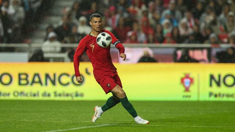 Cristiano Ronaldo dalam laga pemanasan Piala Dunia 2018 antara Portugal vs Aljazair. Copyright: © Getty Images