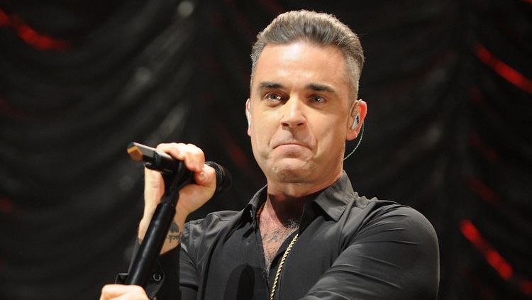 Robbie Williams penyanyi profesional yang akan tampil di acara pembuka Piala Dunia 2018. Copyright: © Getty Images