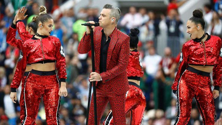 Robbie Williams menjadi salah satu pengisi acara pembukaan Piala Dunia 2018. Copyright: © Reuters