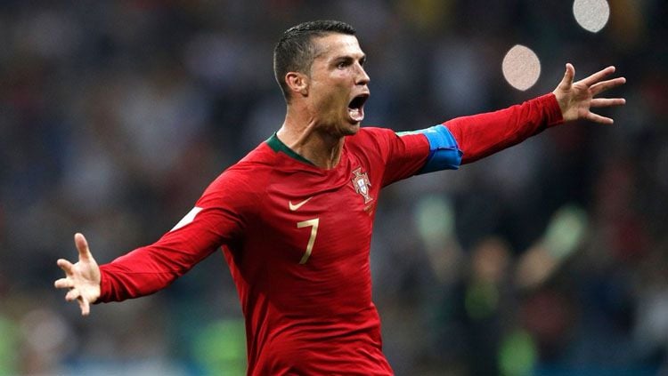 Selebrasi Cristiano Ronaldo setelah membobol gawang Spanyol di Piala Dunia 2018. Copyright: © Twitter @ChampionsLeague