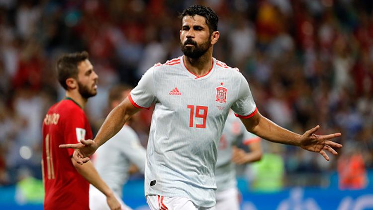 Diego Costa mencetak 2 gol ke gawang Portugal dalam pertandingan pertama Grup B Piala Dunia 2018, Sabtu (16/06/18). Copyright: © Getty Images