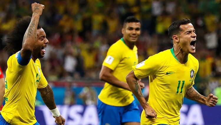 Selebrasi Philippe Coutinho usai membuka keunggulan Brasil atas Swiss di Piala Dunia 2018. Copyright: © Twitter @nizamipsir.