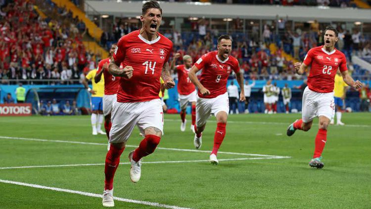 Momen ketika Steven Zuber meerayakan gol ke gawang Brasil di Piala Dunia 2018. Copyright: © Getty Images