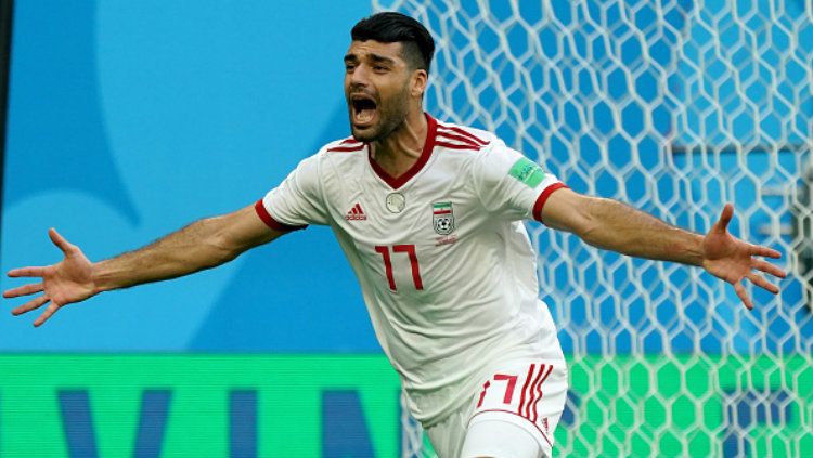 Mehdi Taremi (Iran) merayakan gol yang dicetaknya ke gawang Maroko di laga Piala Dunia 2018. Copyright: © Getty Images