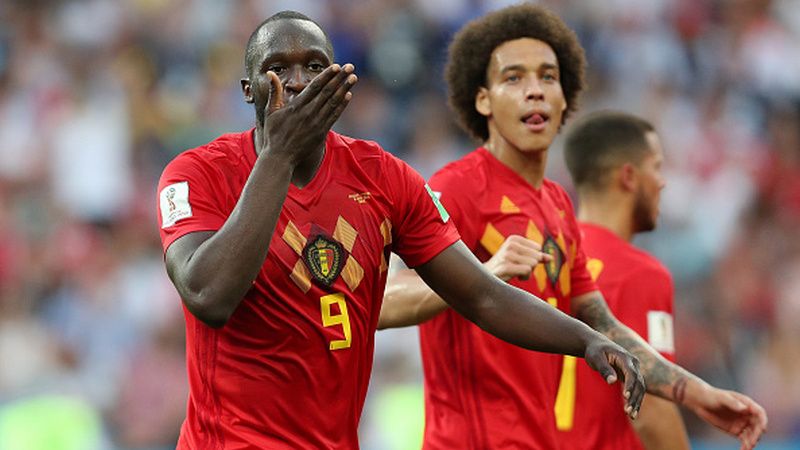 Selebrasi unik Lukaku dengan menempel tangannya ke mulutnya. Copyright: © Getty Images