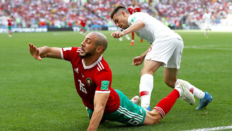 Nordin Armabat terjatuh di laga Portugal vs Maroko Piala Dunia 2018. Copyright: © Getty Images