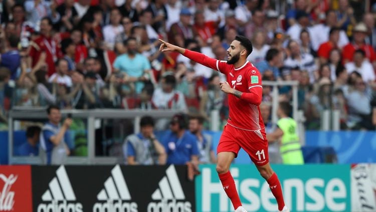 Selebrasi pemain Tunisia, Dylan Bronn saat mencetak gol ke gawang Timnas Belgia. Copyright: © FIFA