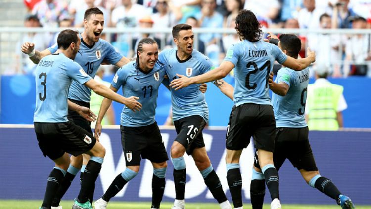 Pemain Uruguay selebrasi dalam laga kontra Rusia di laga ketiga Grup A Piala Dunia 2018. Copyright: © Getty Images