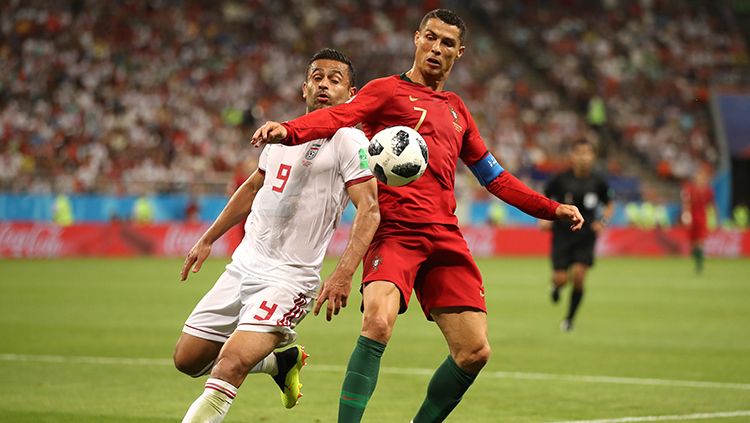 Momen di pertandingan Iran vs Portugal. Copyright: © Getty Images