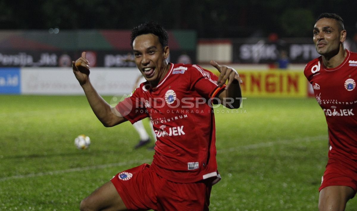 Pemain Persija Jakarta Novri Setiawan merayakan gol di Liga 1 2018. Copyright: © Herry Ibrahim/Soicaumienbac.cc