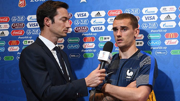 Antoine Griezmann saat diwawancara usai pertandingan. Copyright: © Getty Images