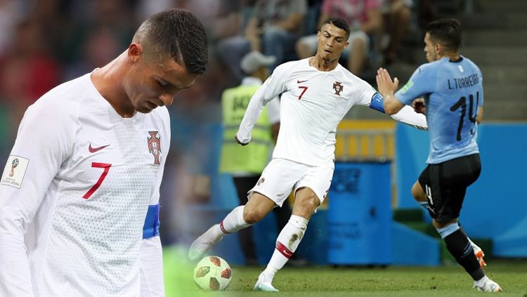 Cristiano Ronaldo tertunduk lesu karena Portugal hanya mampu sampai 16 besar dikalahkan Uruguay. Copyright: © Getty Images