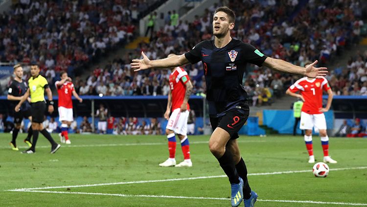 Andrej Kramaric membalas gol pertama Rusia dan membuat Kroasia menyeimbangkan kedudukan. Copyright: © Getty Images