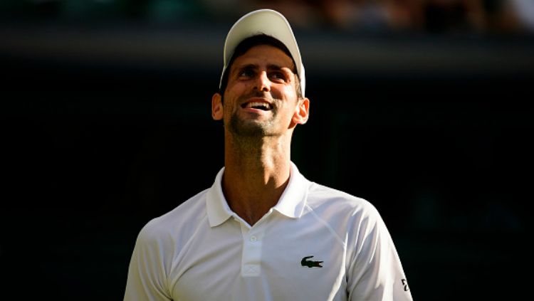 Novak Djokovic menjuarai tunggal putra Wimbledon usai mengalahkan Matteo Berrettini. Hasil ini membawanya menyamai rekor Roger Federer dan Rafael Nadal. Copyright: © Getty Images