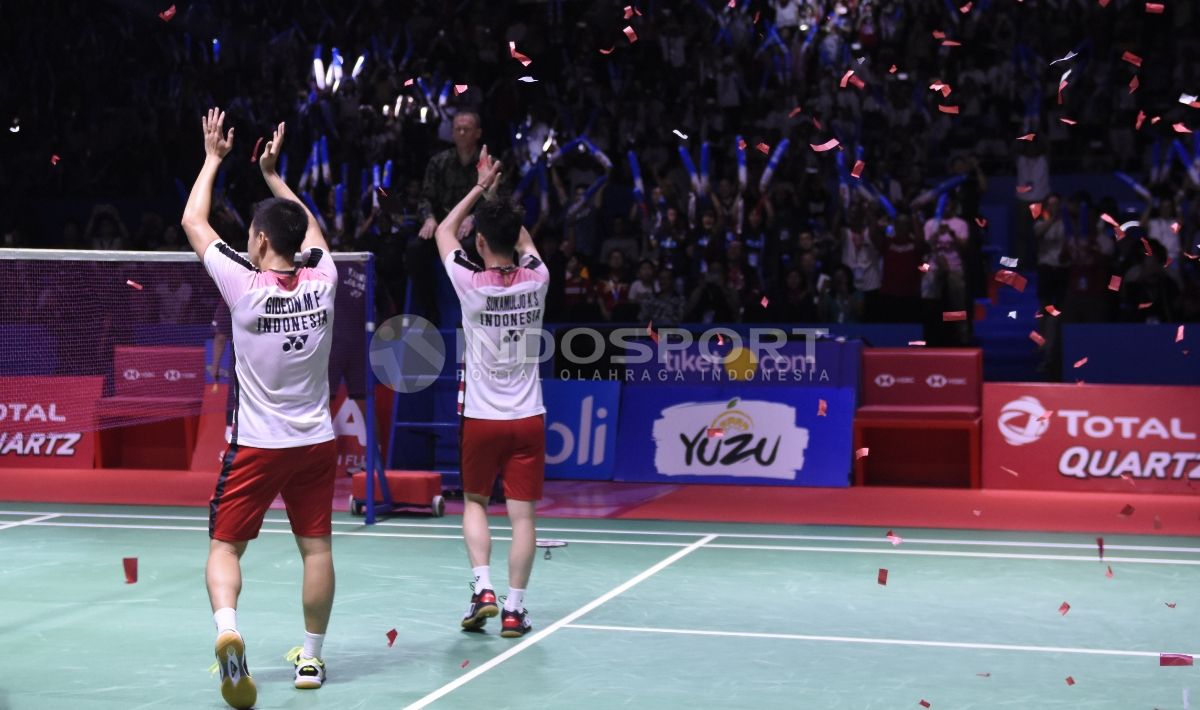 Aksi selebrasi Marcus Fernaldi Gideon/Kevin Sanjaya Sukamuljo menjadi juara Indonesia Open 2018. Copyright: © Herry Ibrahim/INDOSPORT